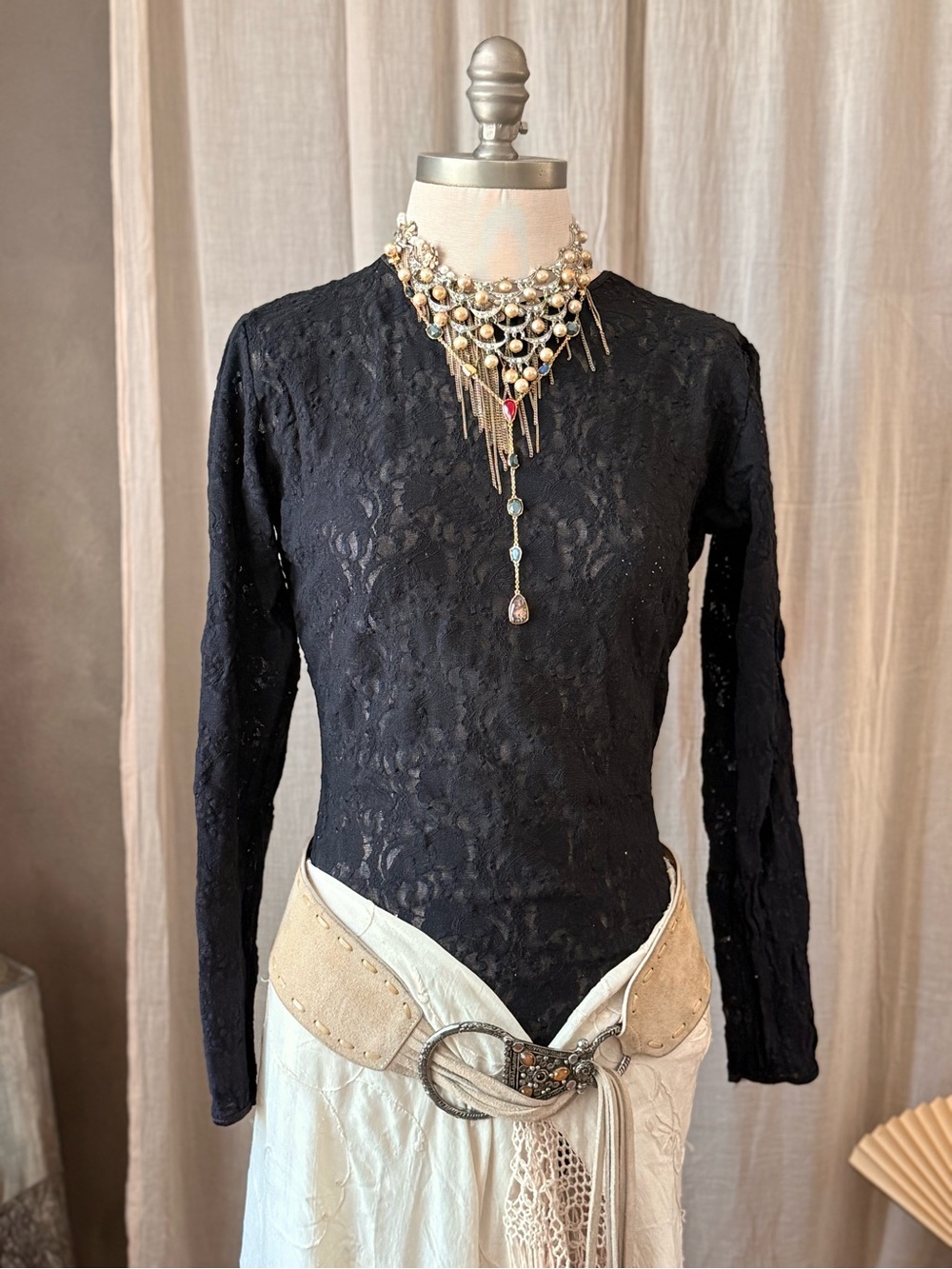 Vintage Black long sleeve bodysuit with a sheer stretchy fabric and a scoop neck